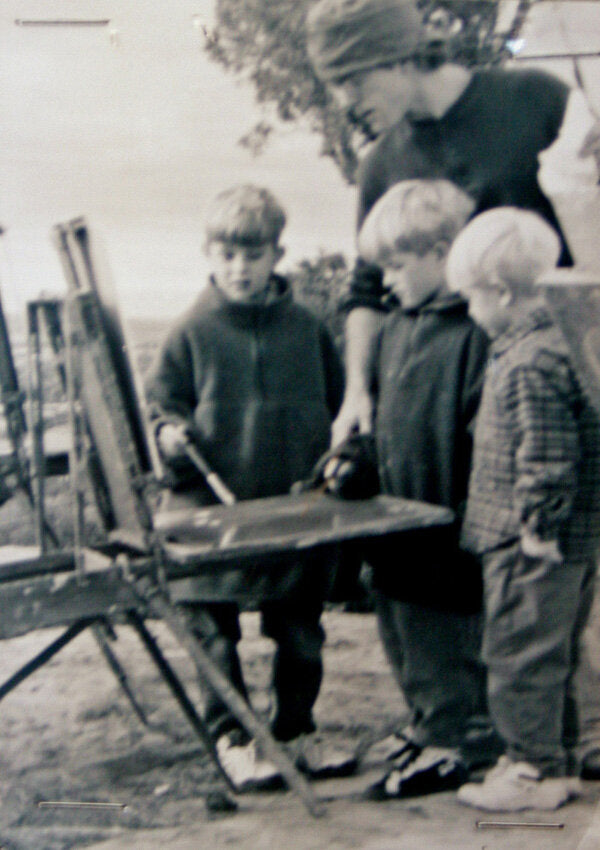 Scott Switzer painting outdoors with his three young sons, 1994